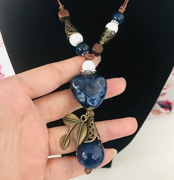 Blue Ceramic Heart Pendant Necklace with Bronze Leaf Charm, Long Adjustable Cord